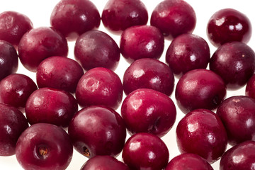 Cherry ,frozen.Macro,frozen organic Cherry,handful of sweet,luscious frozen Cherry isolated on white background,quick-frozen,healthy food.Winter vitamins