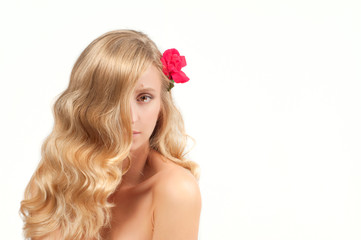 Naklejka premium Portrait of blond woman with long healthy hair. Beauty and spa, girl with perfect skin.