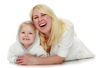 Mother and little daughter hugging.