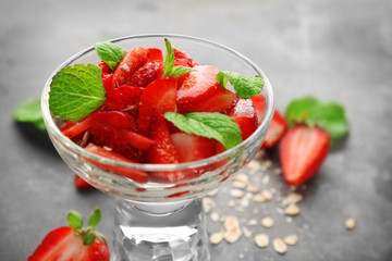 Delicious dessert with fresh strawberry on table