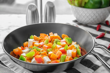 Plate with delicious sliced sweet potato on table