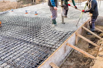 pouring concrete slab - foundation of new house - 178752800