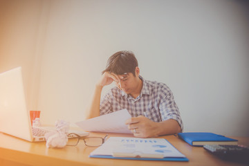 Stressed Man Working On Laptop