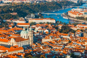 Poster aerial view of mala strana district, Prague Czech republic, red tile roofs © dziewul
