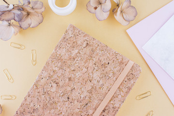 Top view image of notebook with with pen.