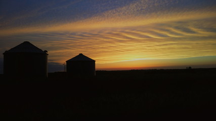 Sunset over a farm in the counryside