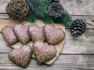 Christmas gingerbreads on a wooden table