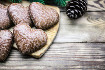 Christmas gingerbreads on a wooden table