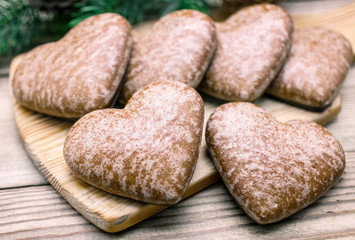 Christmas gingerbreads on a wooden table