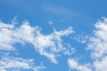 Blue sky with clouds. Daylight blue sky background