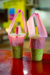 Thai pandan short vermicelli in palm-sugar coconut milk or 