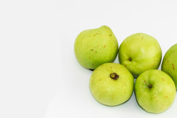 Green fresh sweet guava on white background