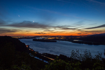 Portland and a glowing Columbia River at sunset