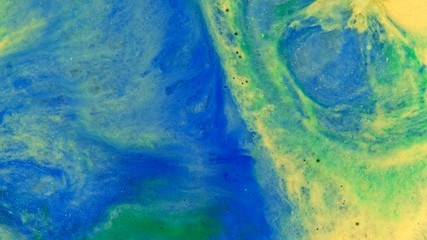 Bright Vibrant Swirling Colors - explosion of gold blue and green yellow