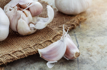 Garlic cloves on table.