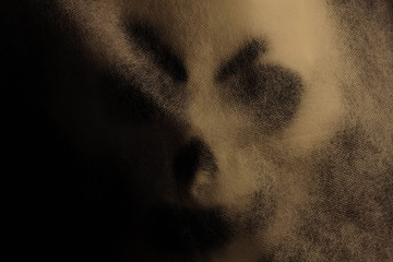 Fototapeta premium Ghost mask in the dark.