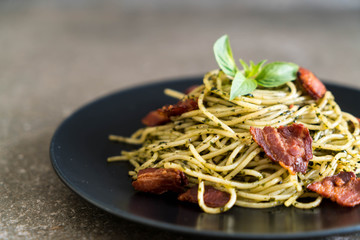 Spaghetti with basil pesto and bacon