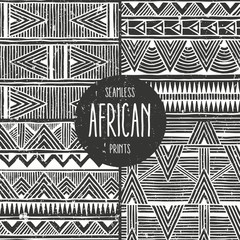 Set of 4 seamless ethnic backgrounds. Monochrome abstract seamless prints in african style. All patterns are available under the clipping mask. EPS10 vector illustration. - 178768644