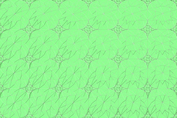 Lines of metal wires on green surface