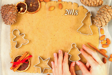 making ginger pastry, cookie cutters, new year background