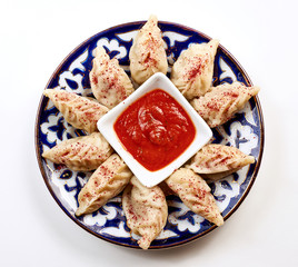 Manta rays on a plate on white background.