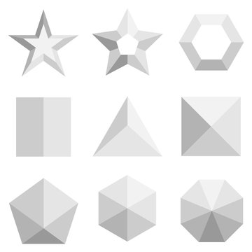 A set of three-dimensional geometric shapes in gray. Top view on geometric shapes