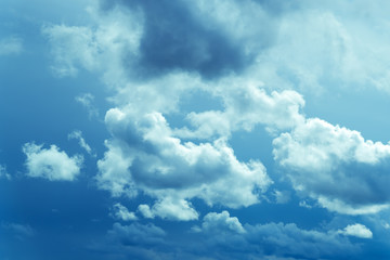 Fototapeta premium Clouds in the blue sky, background