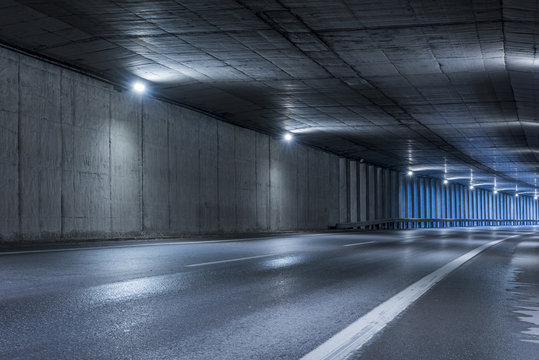 Fototapeta Highway tunnel. Interior of an urban tunnel without traffic. .