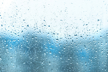 Wet glass with drops, background