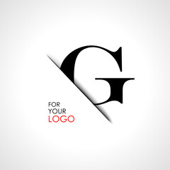 Capital g letter is inserted in the paper slot. To create logos, emblems, monograms.