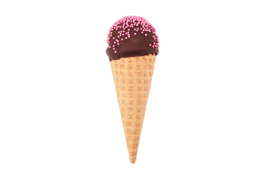 Chocolate cake pop in waffle cone for ice cream, decorated with pink confectionery sprinkles. Isolated. Picture for a menu or a confectionery catalog.