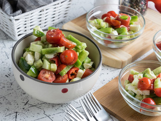 fresh spring vegetable salad with avocado pieces