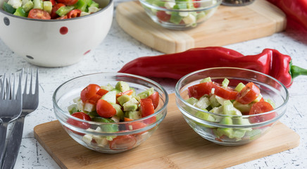 fresh spring vegetable salad with avocado pieces