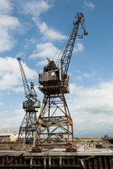 Fototapeta na wymiar Old Level Luffing Cranes - Fremantle - Australia