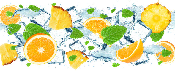 Pineapple and orange splash water and ice cubes isolated