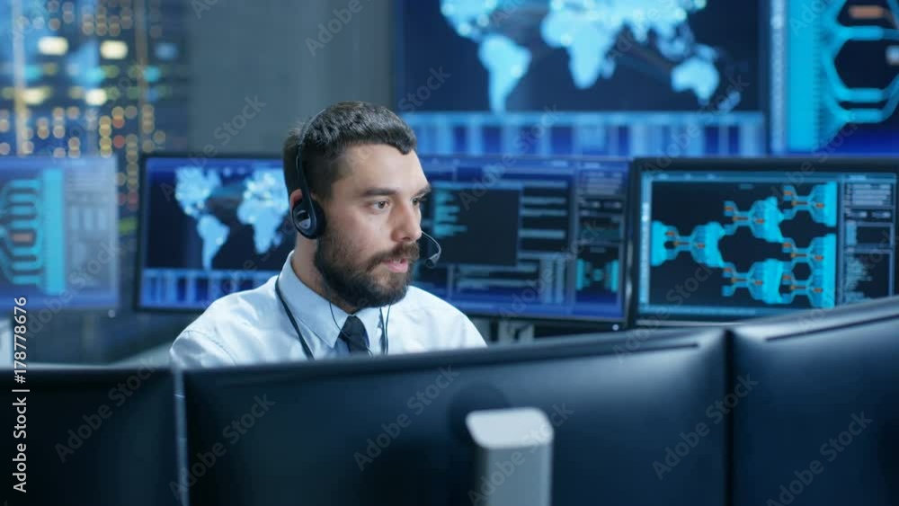 Poster In the System Monitoring Room Dispatcher Speaks into Headset, Observers Proper Functioning of the Facility. 