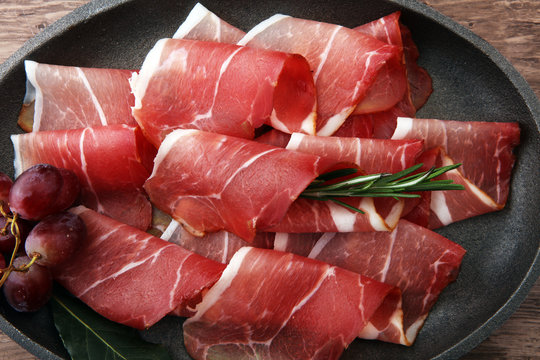 prosciutto with rosemary  or ham of black forest or serrano.