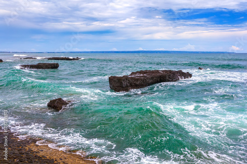 Turquoise Sea Waves Crashing Against The Rocks Roll To The