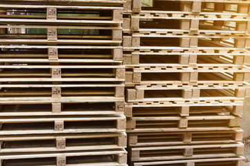 Wooden pallets warehouse, in a warehouse close up.