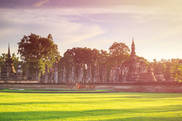 Sukhothai Historical Park at Sunset time, Sukhothai province, Located in a beautiful setting of lawns, lakes and trees in north-central, Thailand
