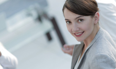 confident business woman on blurred background office.