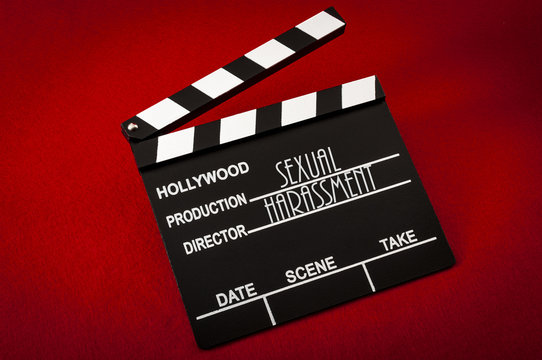 Sexism and sexual harassment in hollywood concept with clapper board representing the movie industry and the text Sexual Harassment