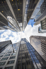 Architectural View of Modern Glass Skyscrapers. Building Against Blue Sky, Manhattan, New York City, New York, USA