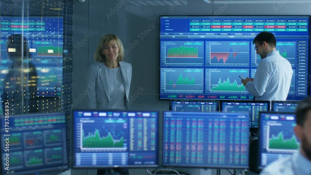 Poster chief executive enters stock market operating room greeting traders and brokers. room is full of mon