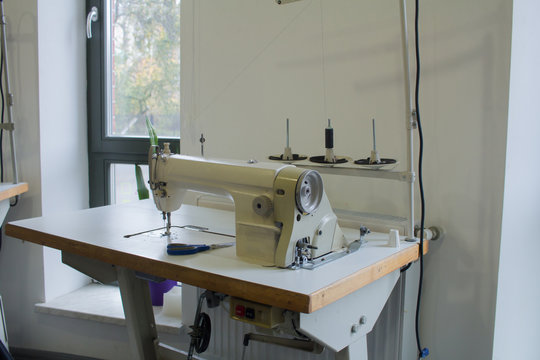  sewing machine on work table in tailor studio 