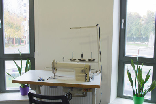  sewing machine on work table in tailor studio 