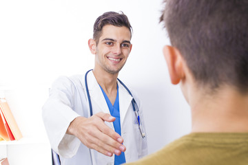 family doctor with patient in consultation