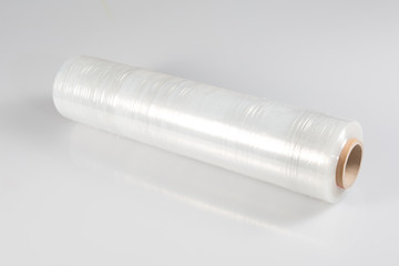 transparent film roll wrapping packaging on white background