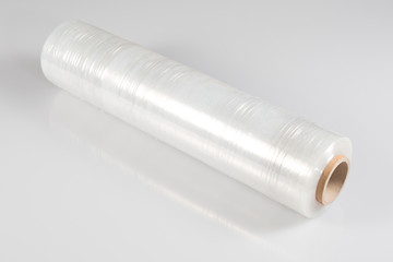 Roll of wrapping plastic stretch film on white background