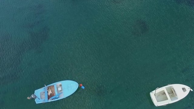 Aerial view of boats in the crystal clear water
